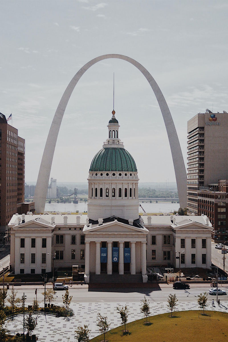 Downtown St Louis with state capital building and Gateway Arch.
