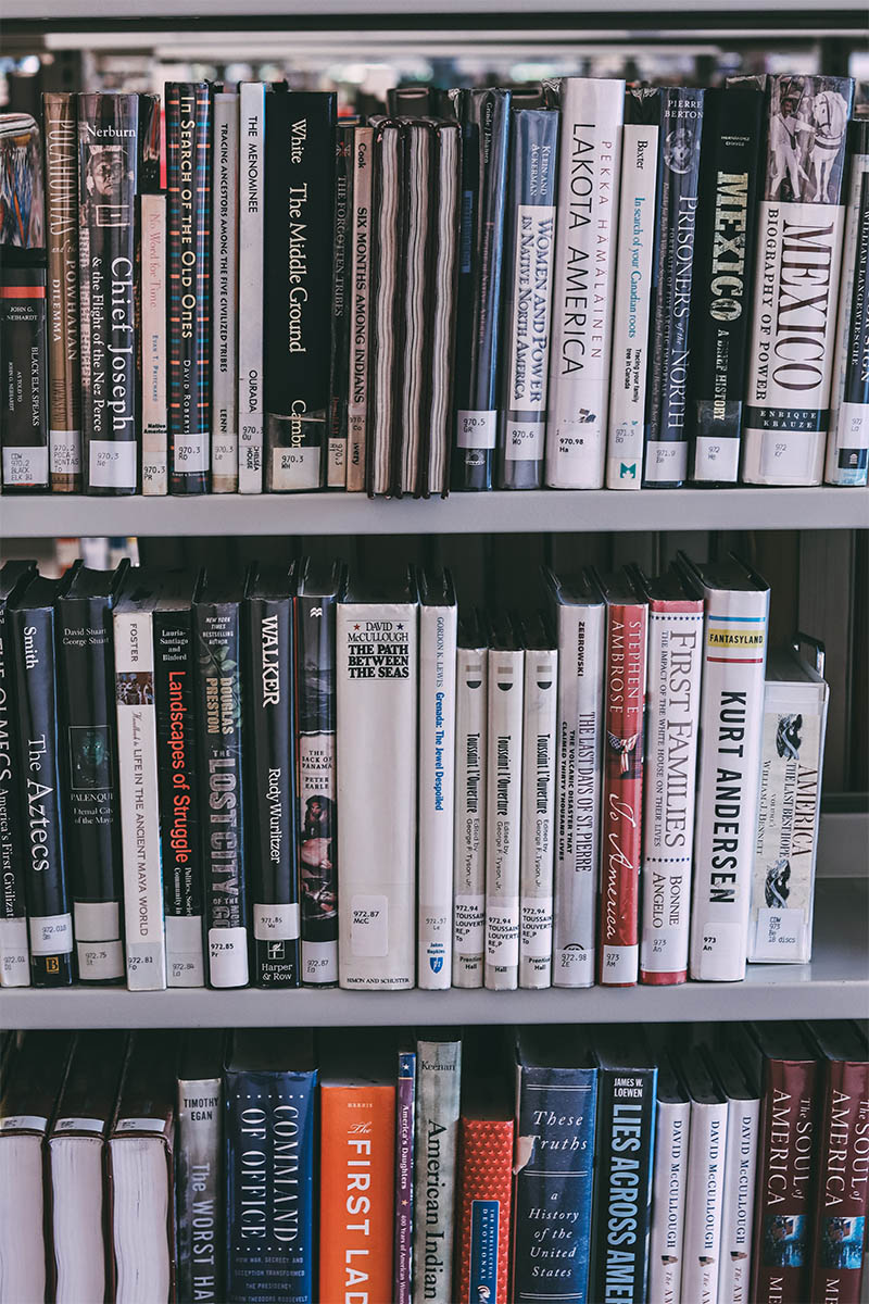 Shelves of books at library.